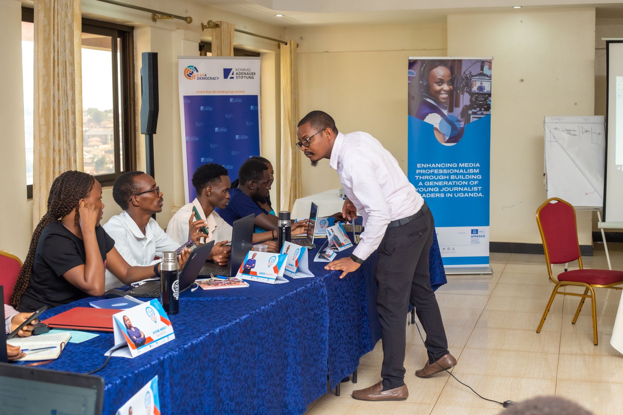 Ultimate Multimedia Facilitator Edward Tumwine, conducting a session on Digital Communication